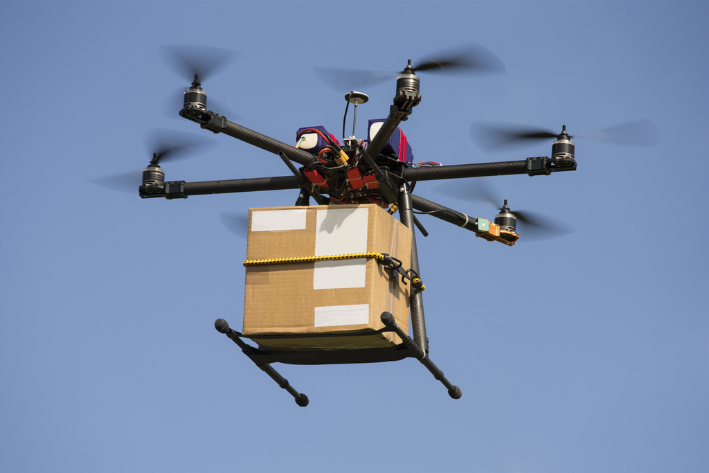 Drone carrying parcel