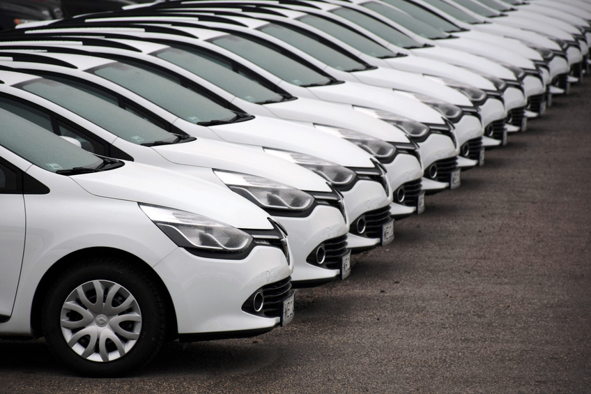 A row of new cars. Social media is changing the relationship of cars and millennials.