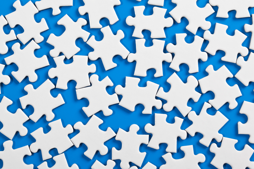 Scattered jigsaw representing STP process